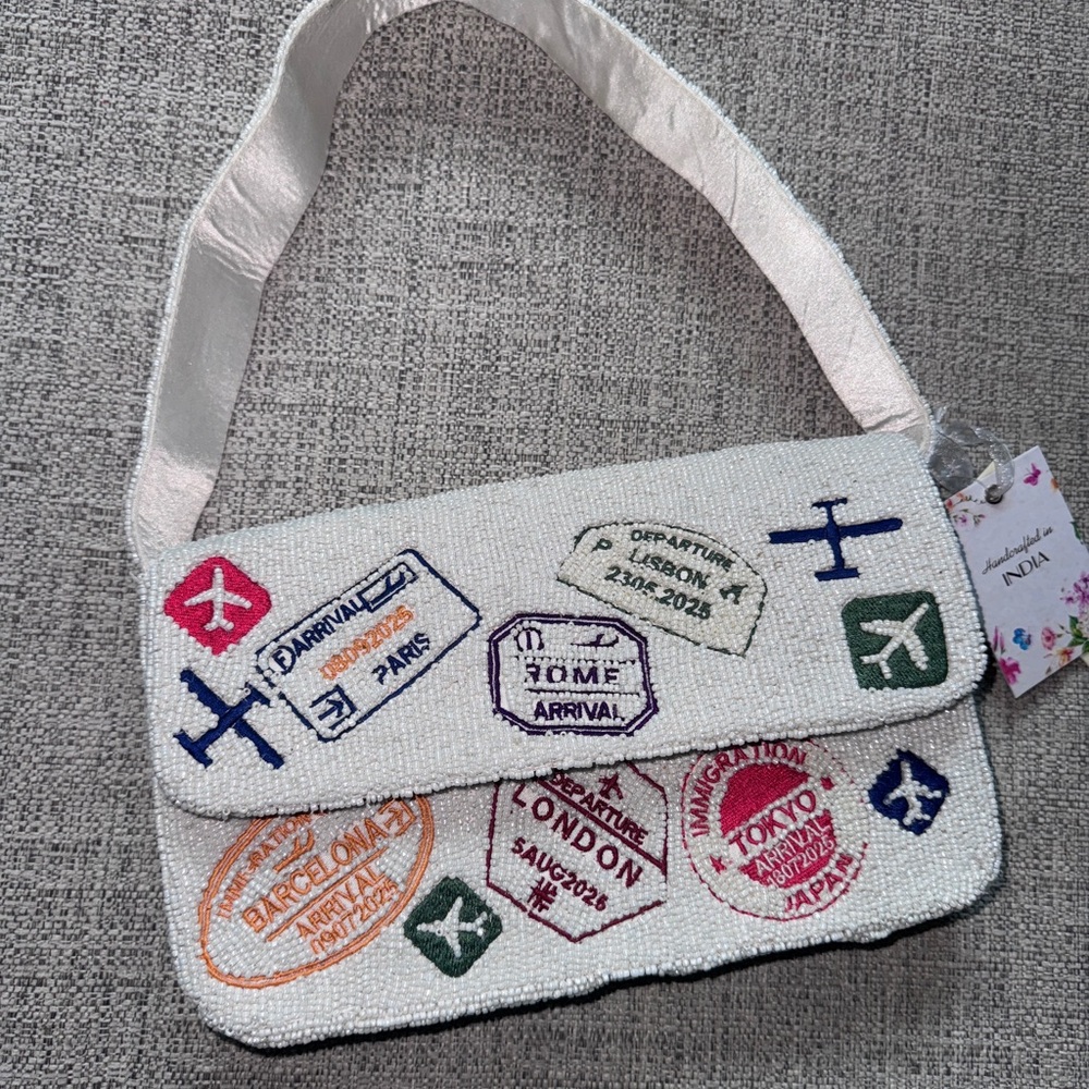 NWT VIRAL Travel Stamp Embroidered White Shoulder Bag